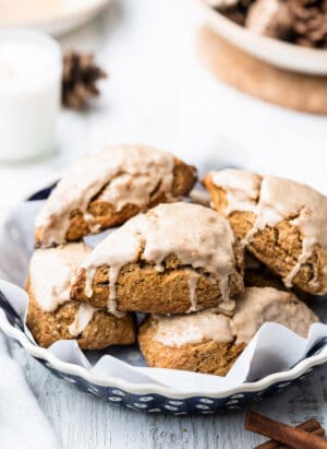 Gingerbread Scones stacked on a blue baking dish